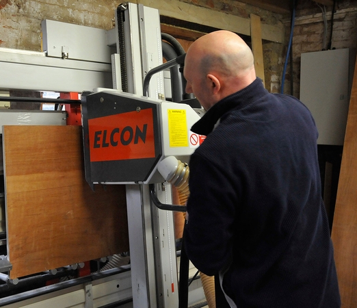 Kev hard at work in the Nest Box Workshop cutting up ply for Owl Nest Box orders - 1st March 2012