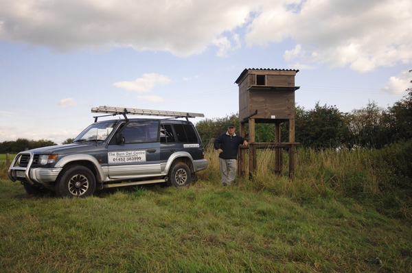 Vince standing proud next to one of the Owl Manors he designed &amp; positioned in the countryside to support wild Barn Owls